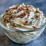 Vibrant chipotle lime mayo in a bowl, rich and zesty, ideal for grilled vegetables and seafood.