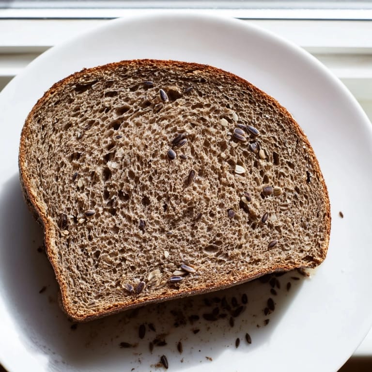 Freshly baked Estonian Leib sourdough, featuring a thick, crusty exterior and perfect for a satisfying sandwich.